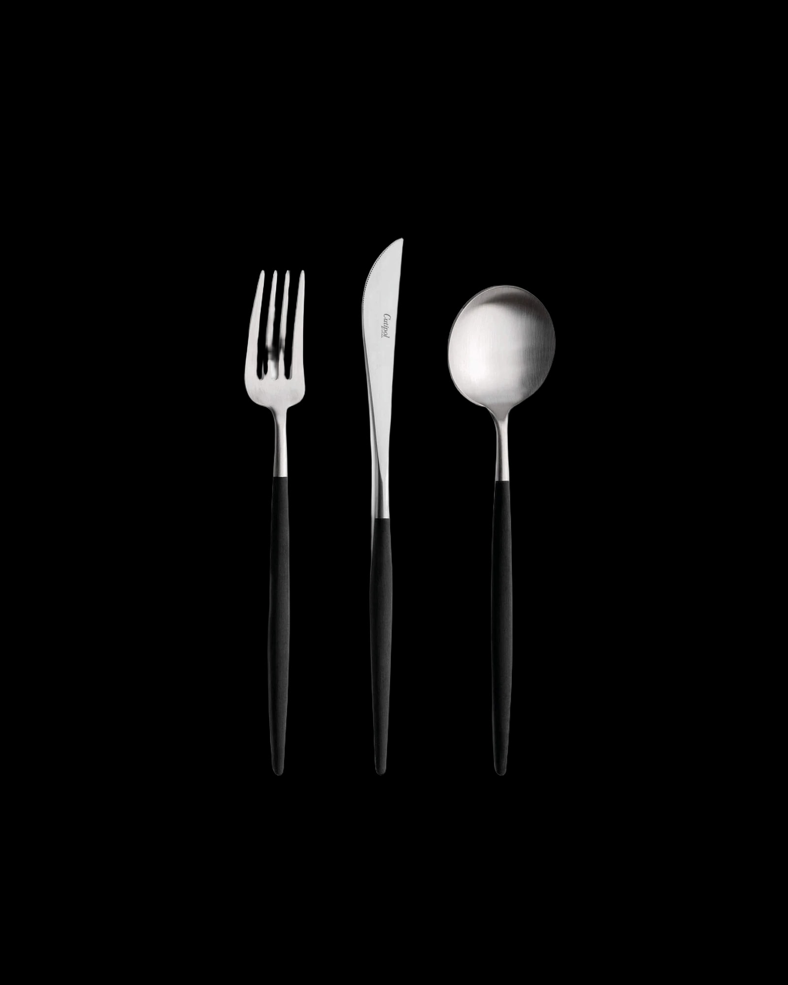 Cutipol Goa flatware with black handles and brushed steel heads.