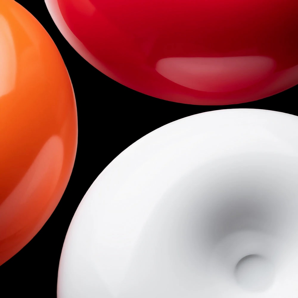 Artemide Nessino table lamp in orange ABS.